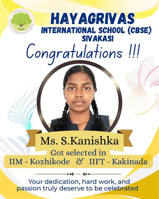 School poster congratulating S. Kanishka on selection to IIM Kozhikode and IIFT Kakinada