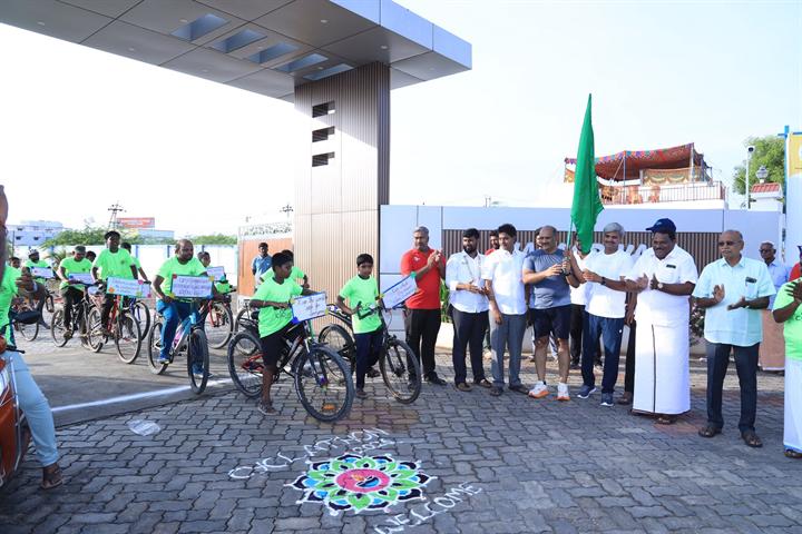 Flag-off of a students' cycle rally from the school gate