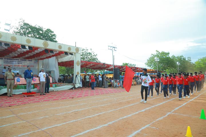 Students in the march past at the 2025 sports meet