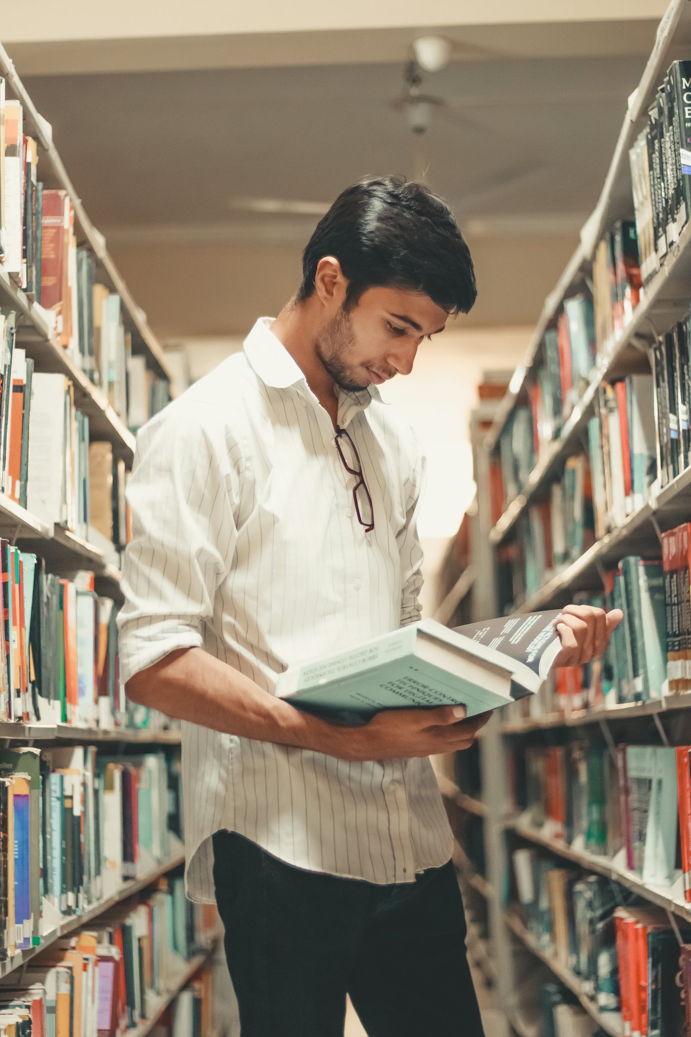 A student reading in the school library