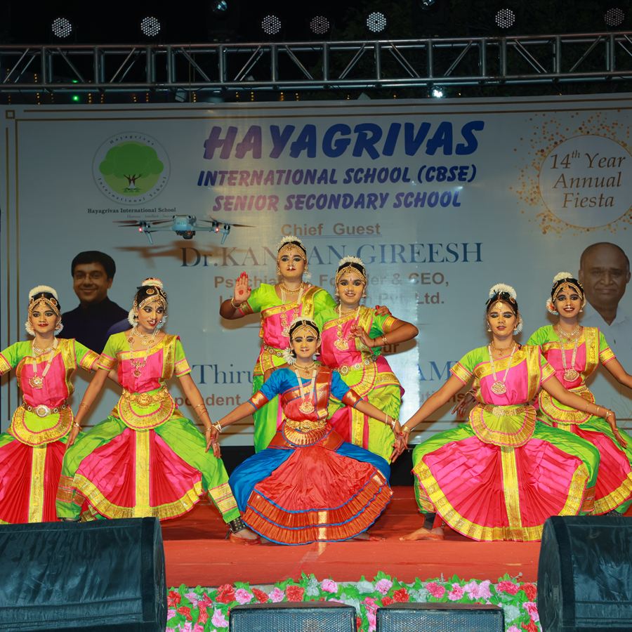Students performing Bharatanatyam on stage at the Annual Fiesta