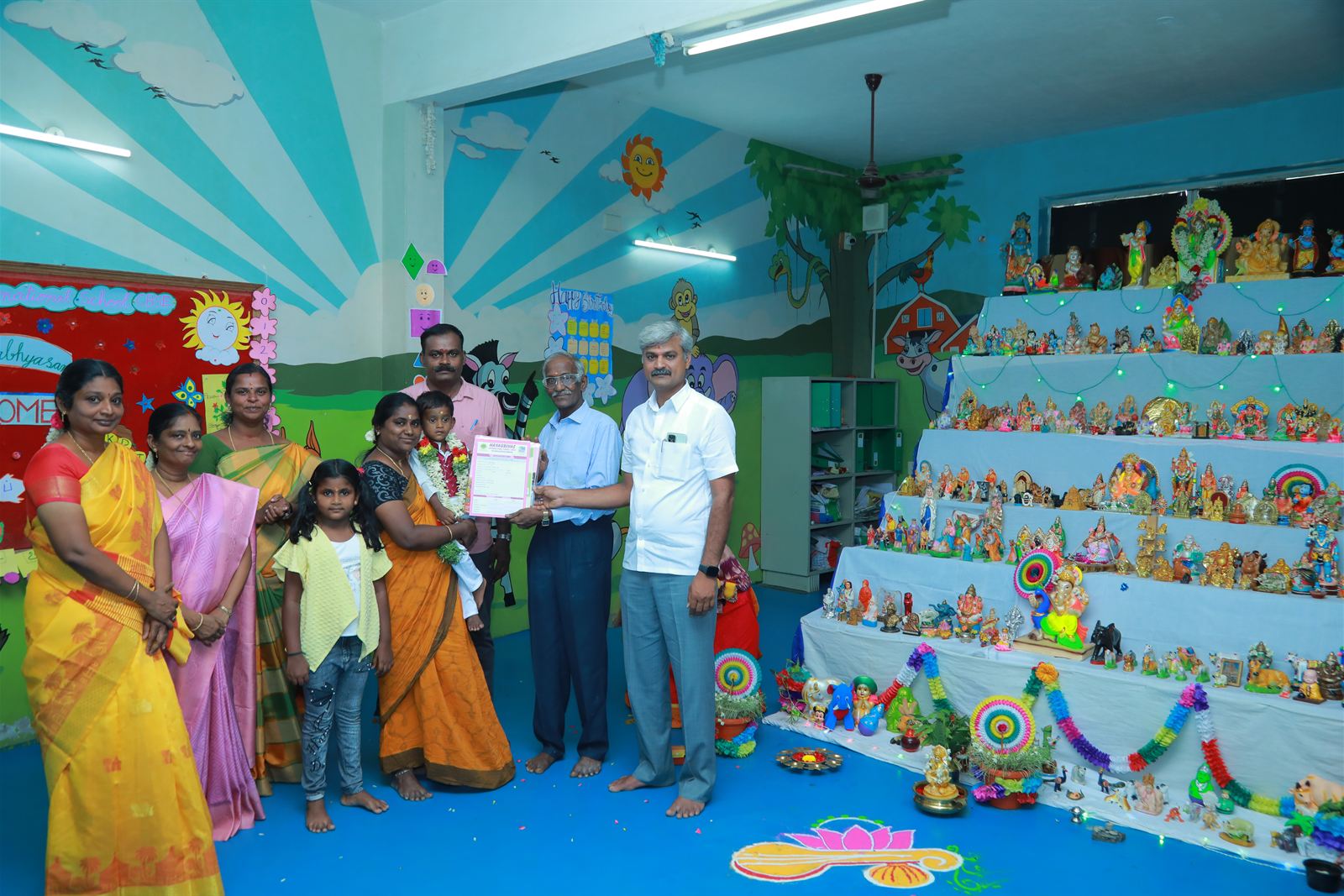 Students and staff at a Golu cultural display